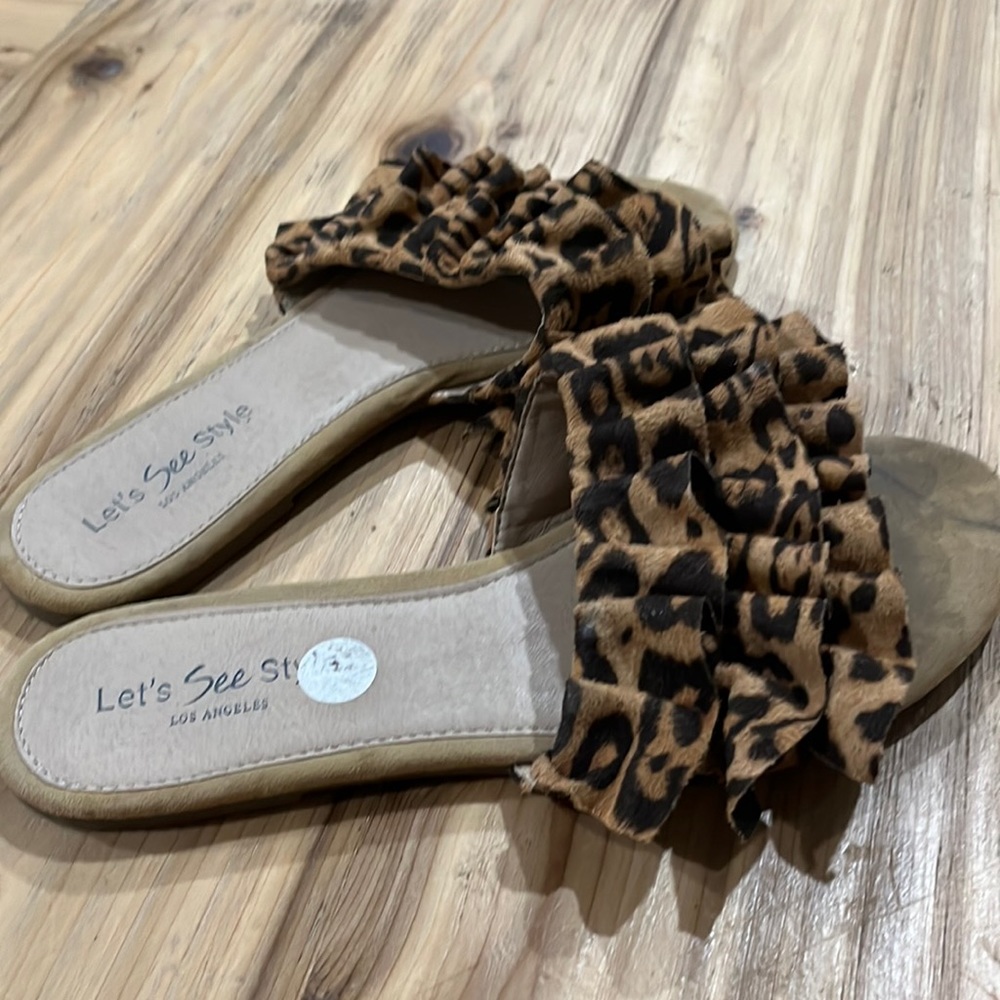 Cheetah ruffled sandal.